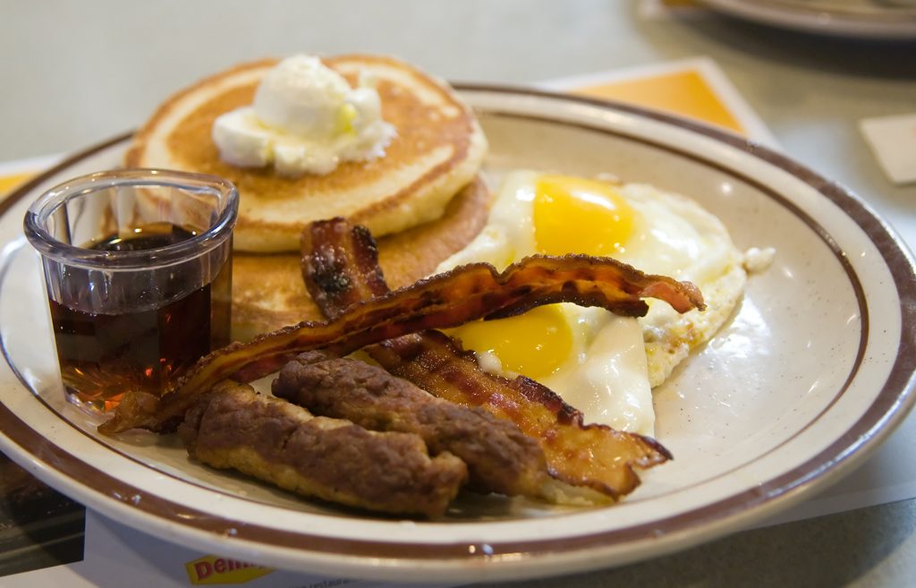 Illustration: Pancakes, eggs, sausage and bacon: the parts of the original Grand Slam, not this restaurant