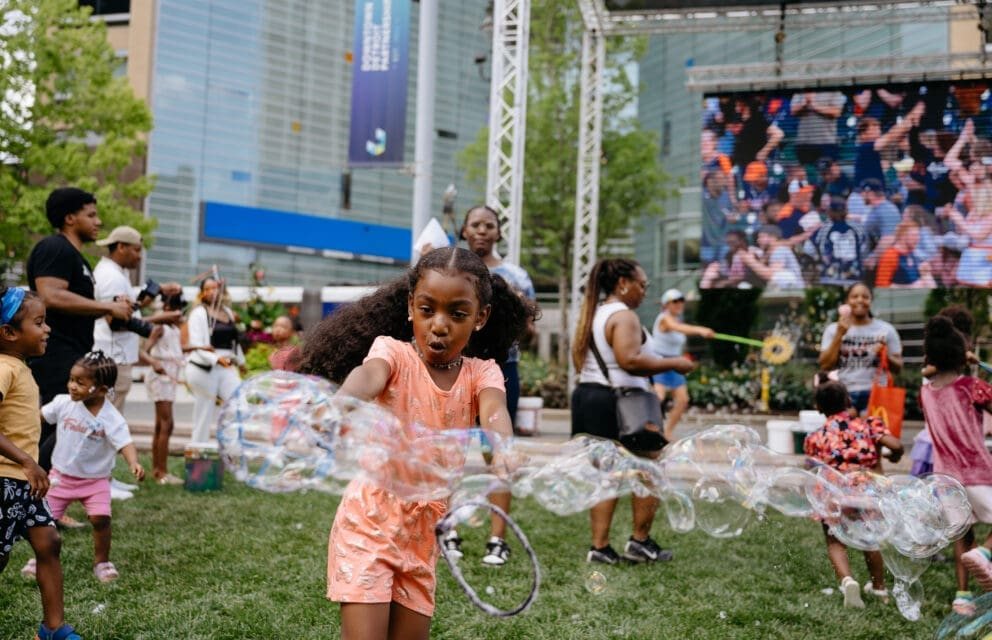 Downtown Detroit Partnership: Families at a Campus Kids Day event in Campus Martius Park