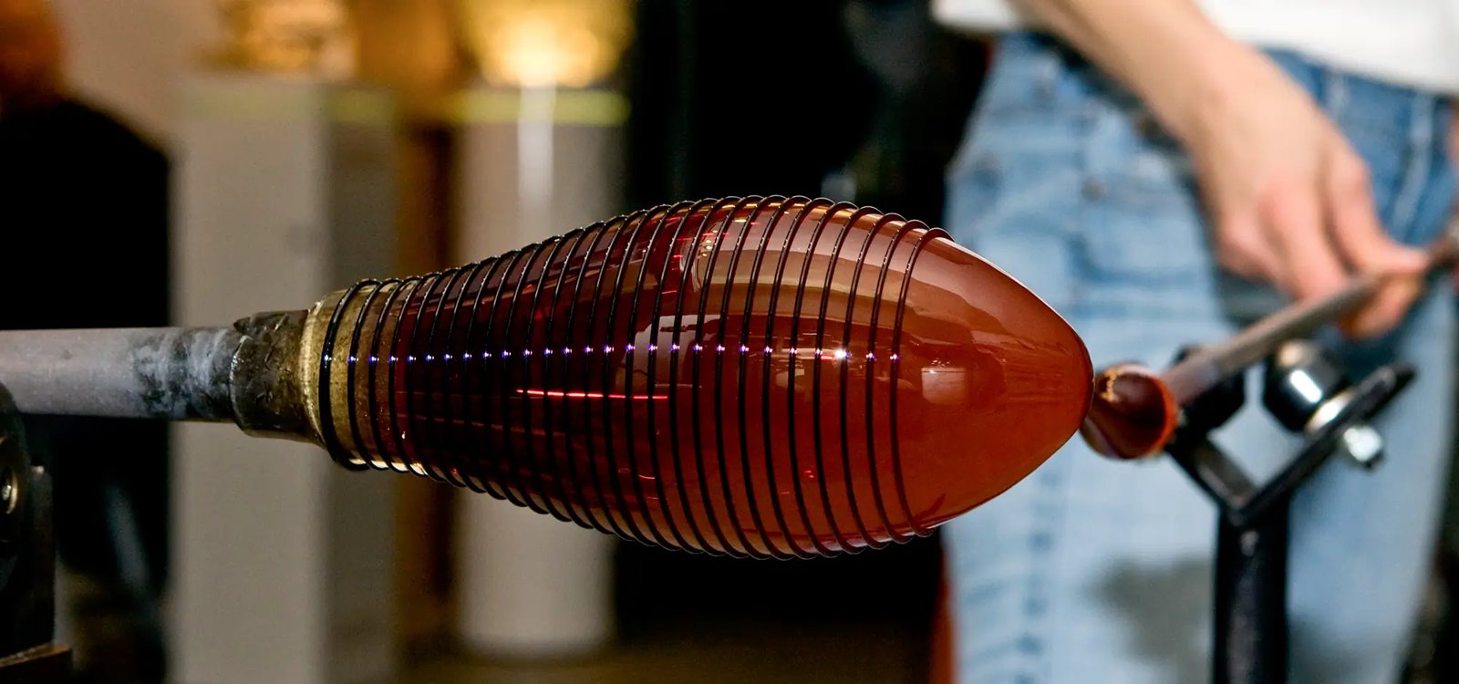 Epiphany Studios: Glassblower wrapping molten glass at the Pontiac studio