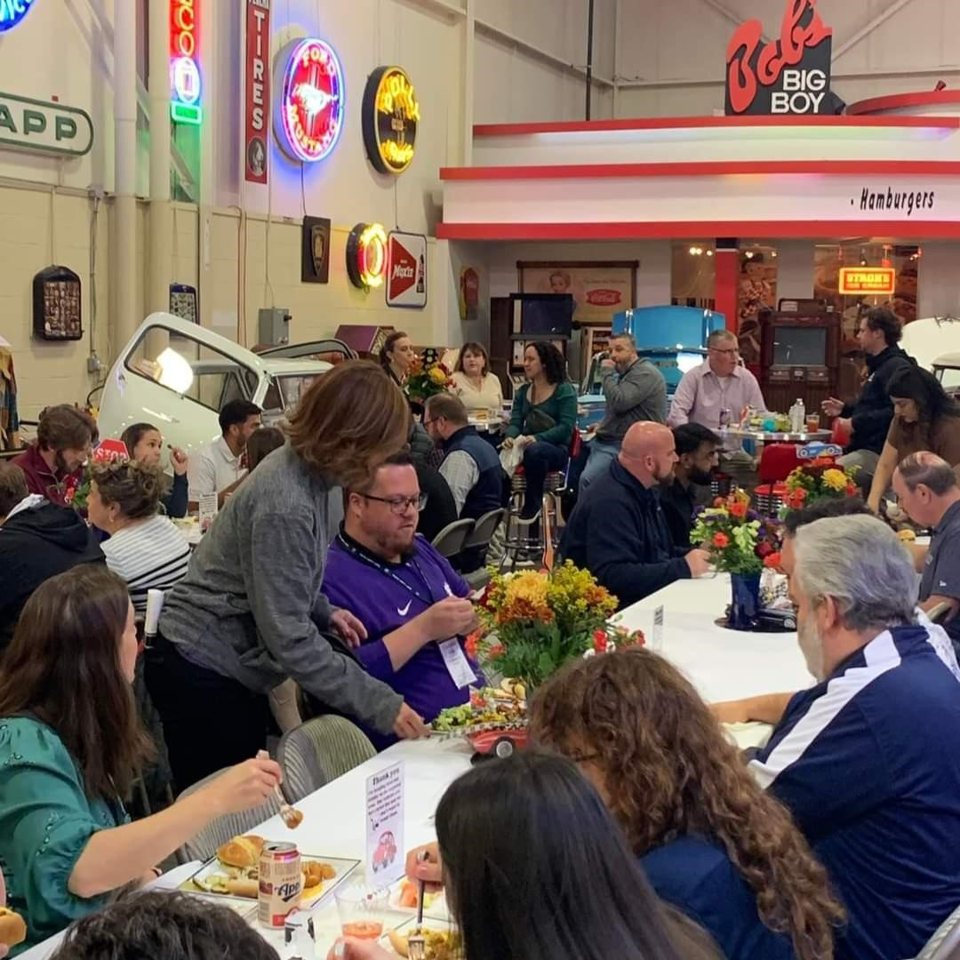 Stahls Motors & Music Experience: Private dinner event among neon signs and a 1950s diner facade inside the museum