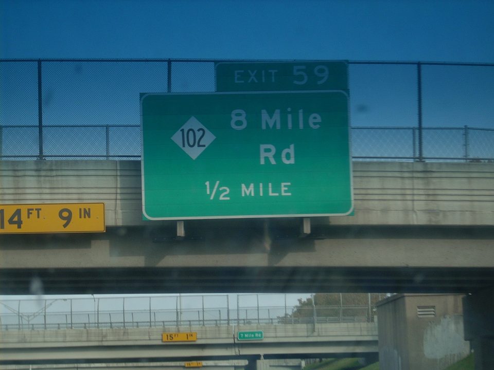 The 8 Mile Road exit sign on I-75
