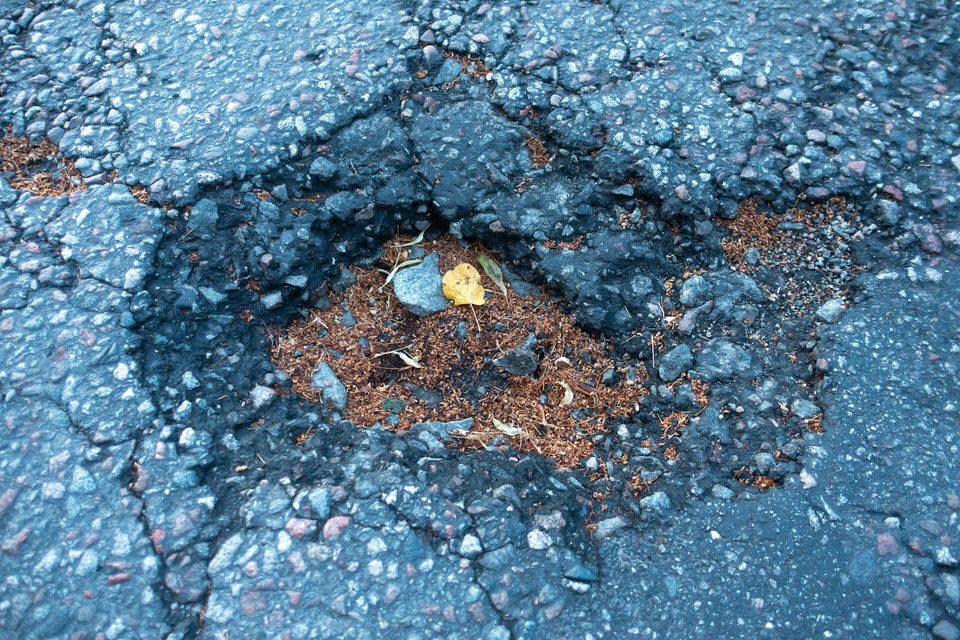 A pothole in the asphalt