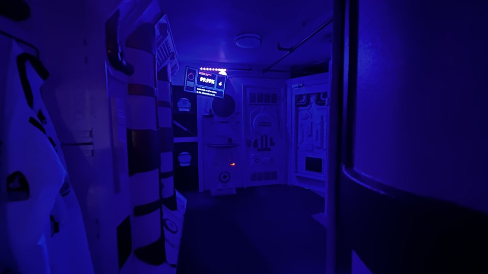 Blue-lit spaceship set with an oxygen supply display and white panels