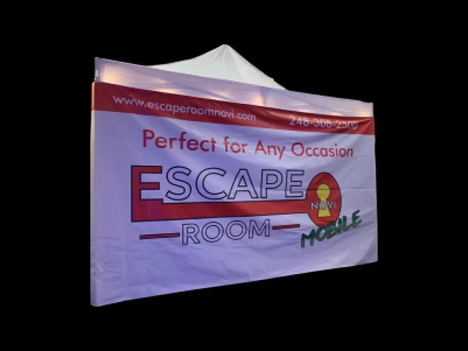 The Escape Room Mobile pop-up tent with its Perfect for Any Occasion banner