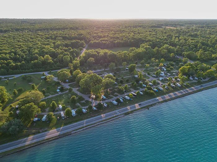 Aerial view of the riverfront campground and the shoreline