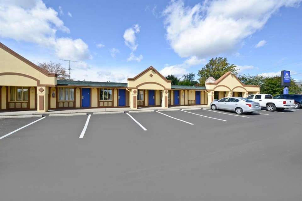 The motel's low building and parking lot