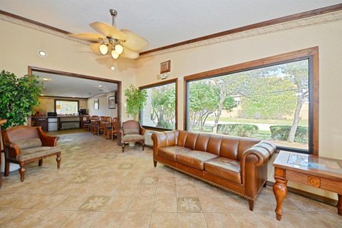 A sitting area with a large window