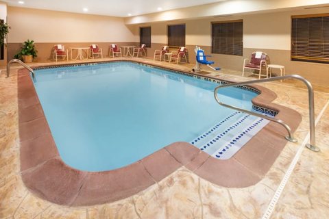 The indoor pool with lounge chairs