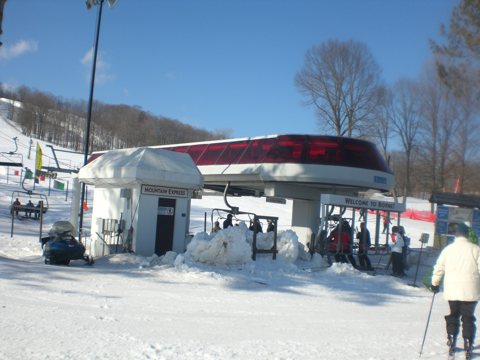 The base station of a six-person chairlift on the snowy slope in 2009