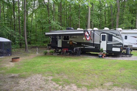 Trailers on the wooded campground