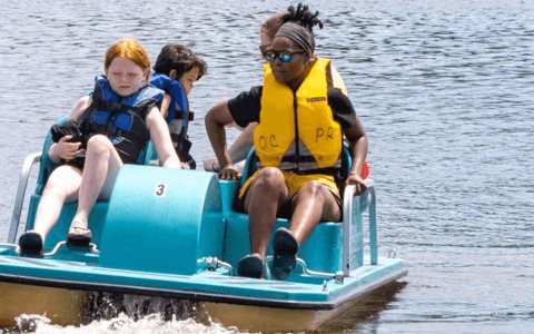 A paddle boat on the park lake