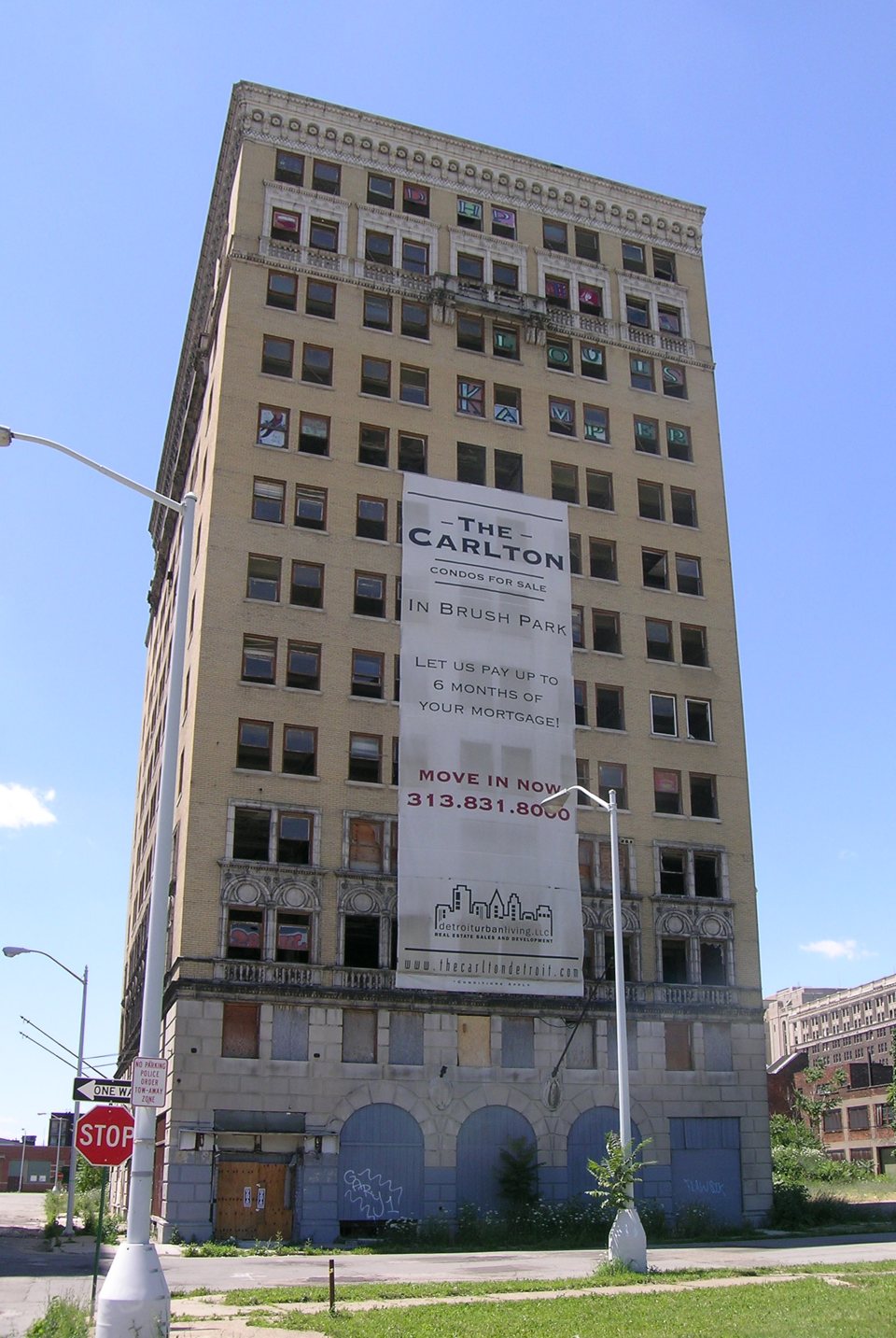 The vacant thirteen-storey yellow-brick Hotel Eddystone in 2008, with a large advertising banner on its facade