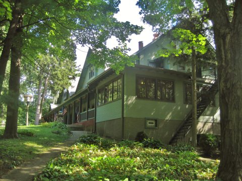 The inn among the trees seen from Lakeshore Road in 2014