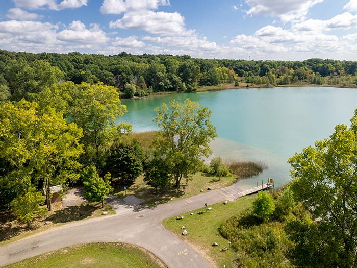 The lake and surrounding woods at the campground