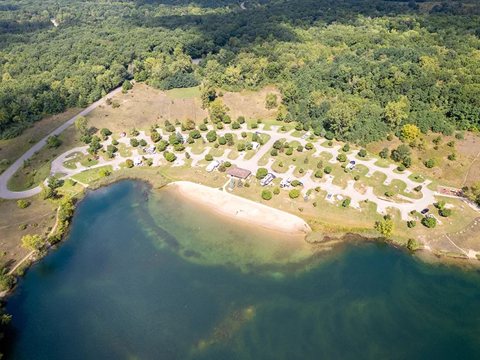 Aerial view of the lake and the campground beach