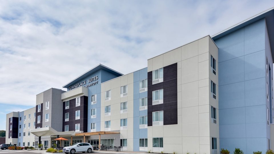 The hotel's modern four-storey building with the TownePlace Suites sign