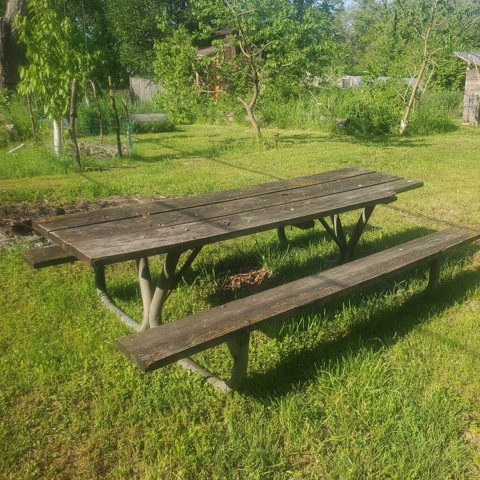 Picnic table on the grassy camping area