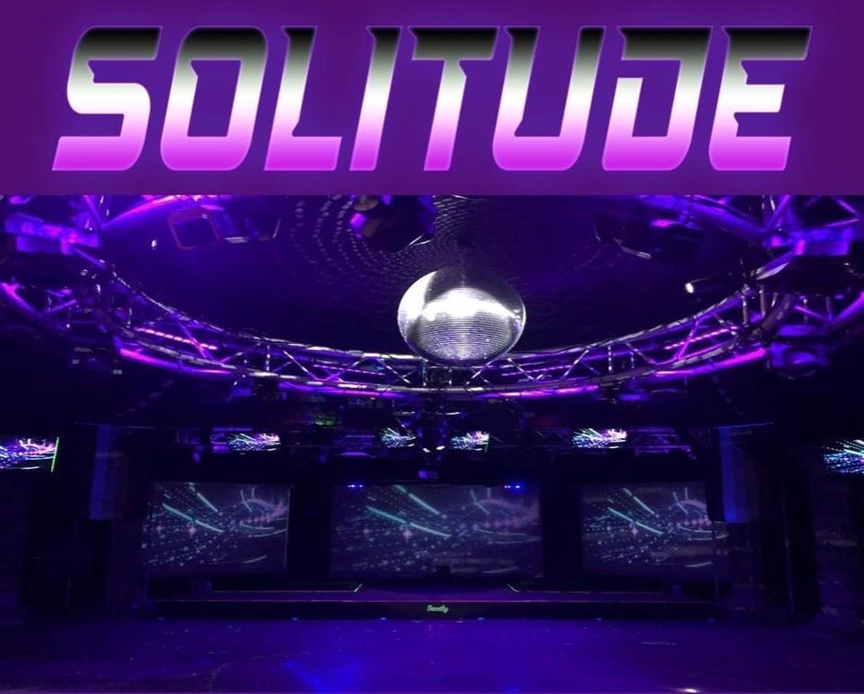 Dance floor with a mirror ball and purple lights under a 'Solitude' title