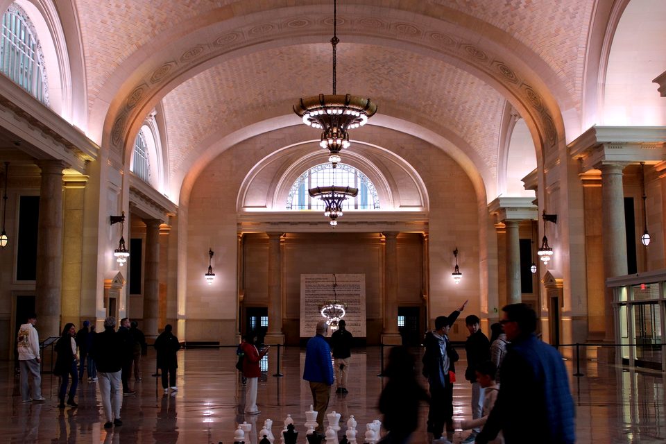Visitors in the restored waiting room, 2025