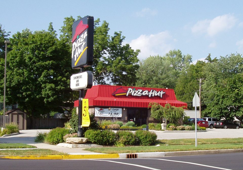 A Red Roof Pizza Hut with the classic pole sign, Bremen, Indiana, 2005
