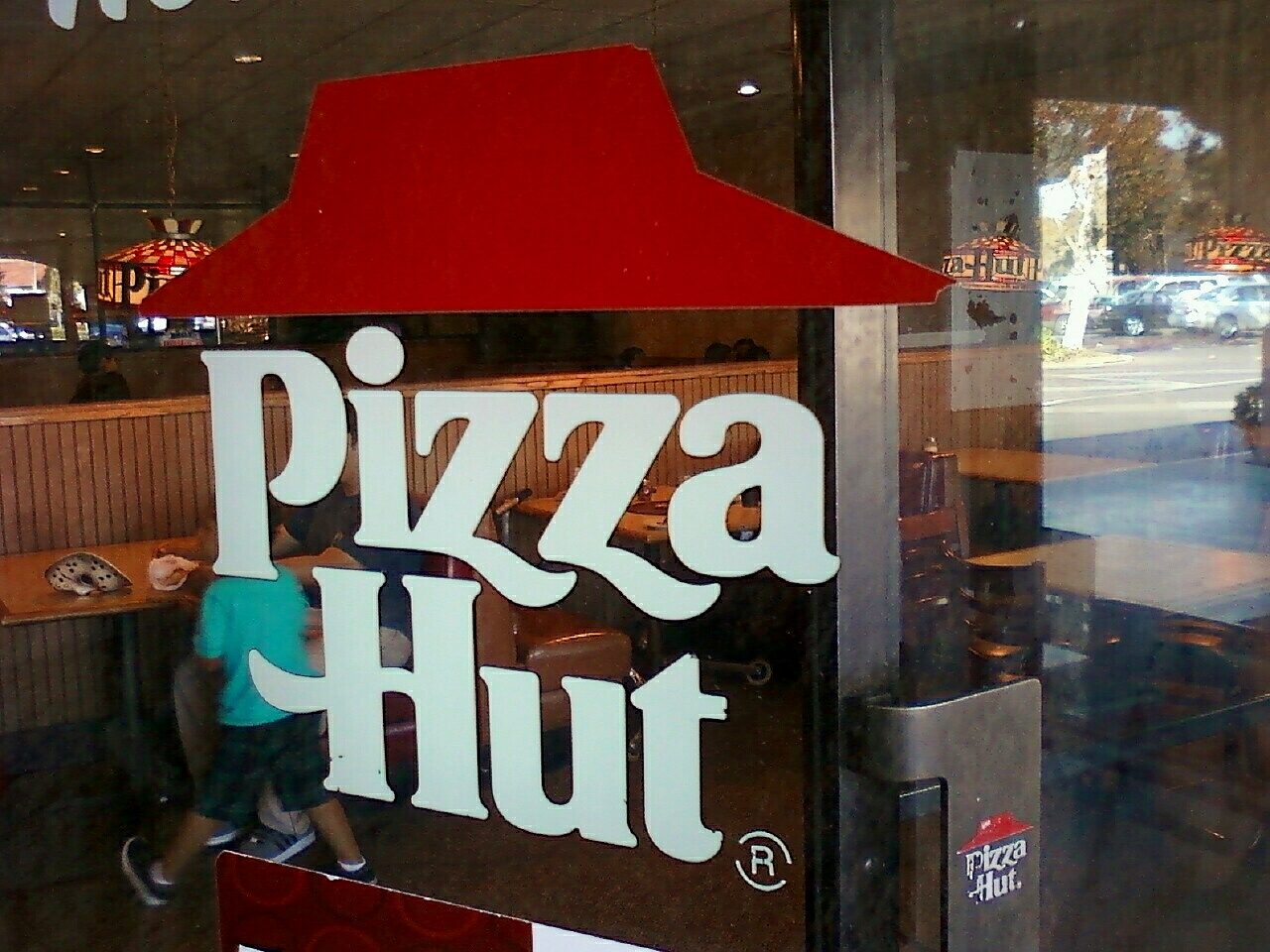 Illustration: the classic roof logo on a door, not this restaurant