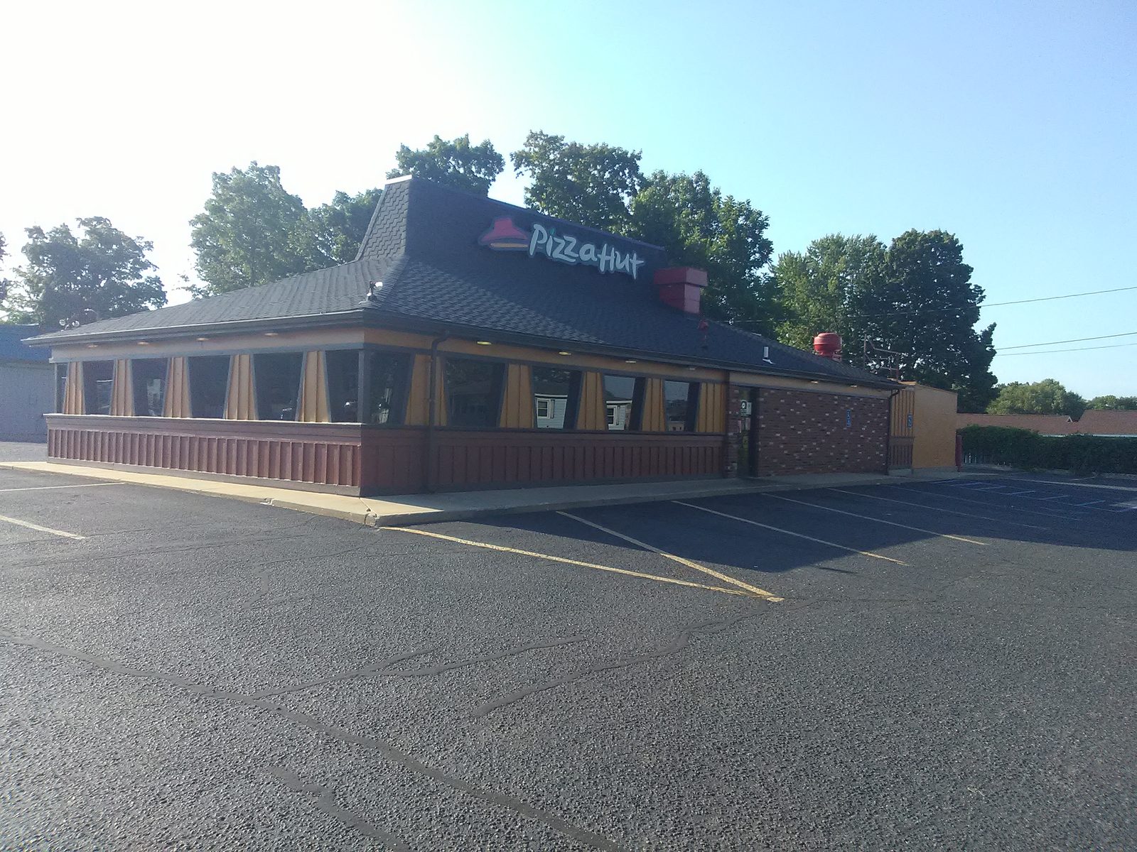 The Three Rivers Pizza Hut with its classic roof, Michigan