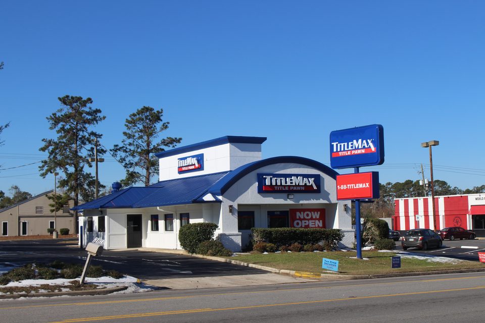 A former Pizza Hut, now a blue-and-white TitleMax, Valdosta, Georgia