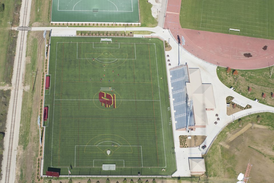 Aerial of the complex: the main field, the east-side grandstand and the neighboring track