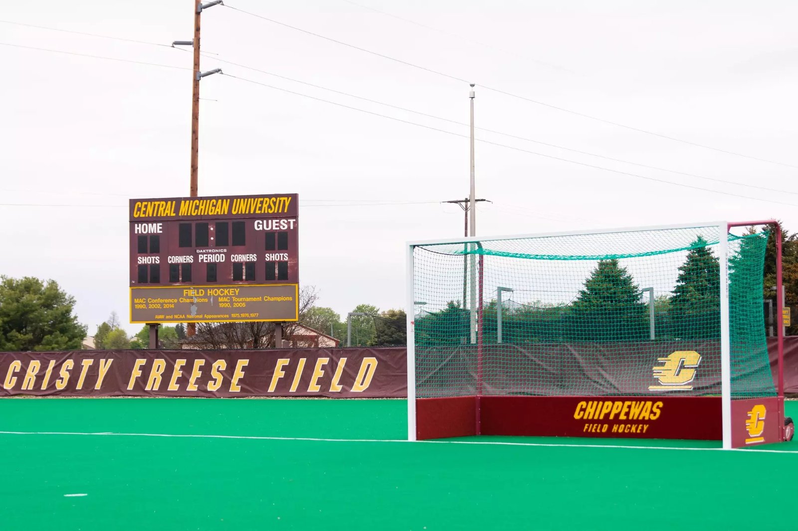 Field hockey goal and scoreboard behind the Cristy Freese Field sign