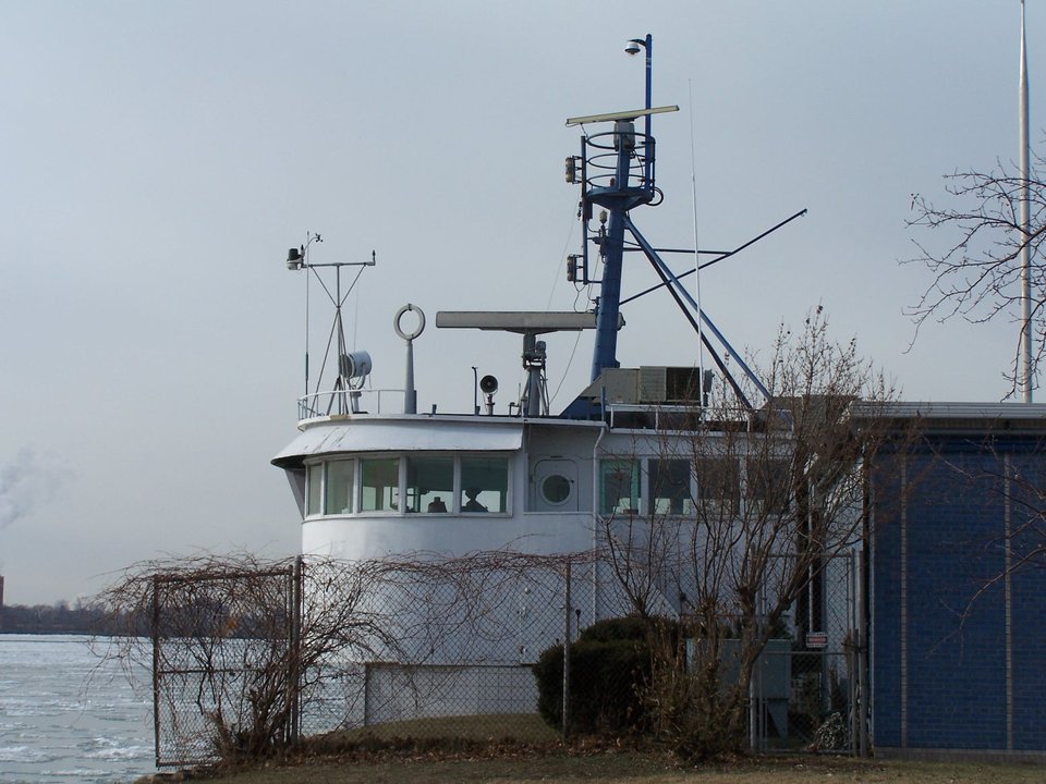 The white pilothouse of the freighter S.S. William Clay Ford on the museum's river side