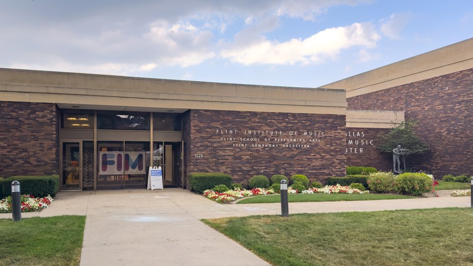 The J. Dallas Dort Music Center entrance with Flint Institute of Music lettering, summer 2026