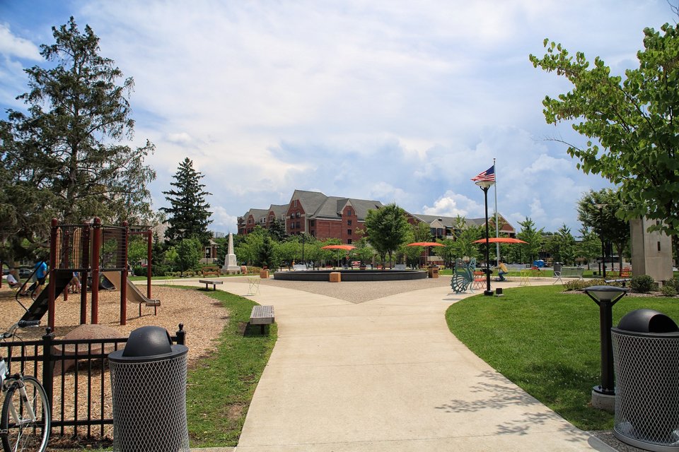 The children's play area and the path toward the fountain