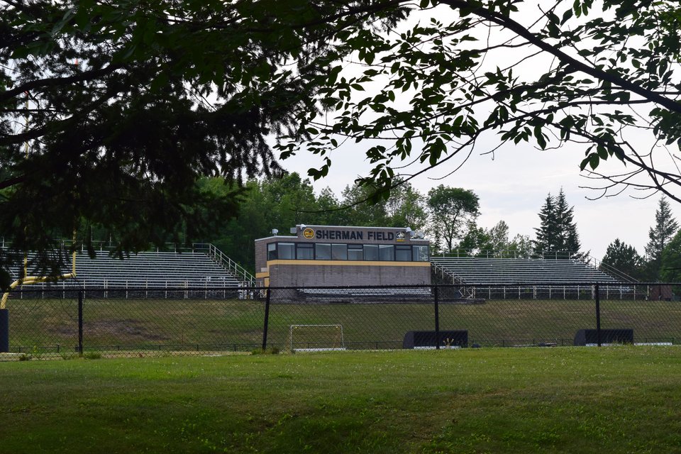 Sherman Field's stands and press box in summer 2017, before the 2021 renovation