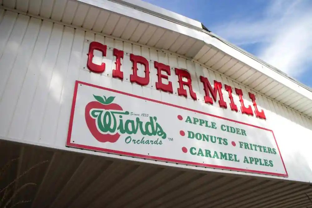 The Wiard's Cider Mill sign on the cider mill building