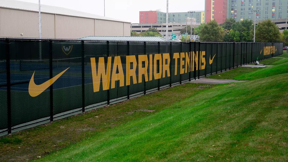Warrior Tennis windscreens on the court fence