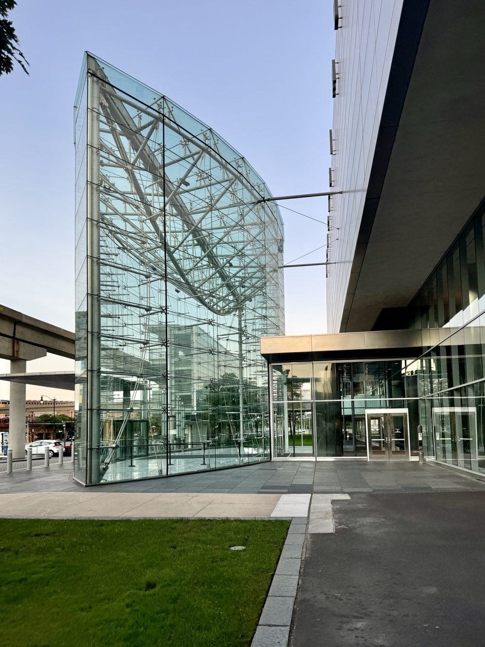 The glass front entrance on Jefferson Avenue, where the concrete berms once stood (2024)