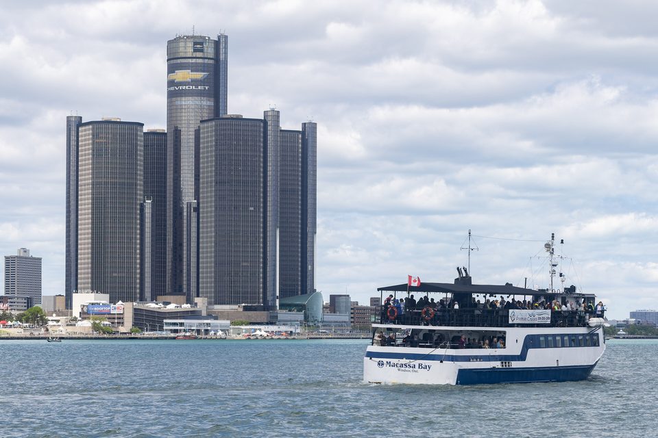 The cruise boat Macassa Bay passing the Renaissance Center on the Detroit River, May 31, 2025