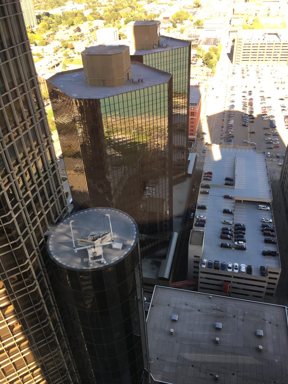 From the Marriott’s 42nd floor: the edge of Tower 200 on the left, towers 500 and 600 in the middle, parking decks on the right (2018)