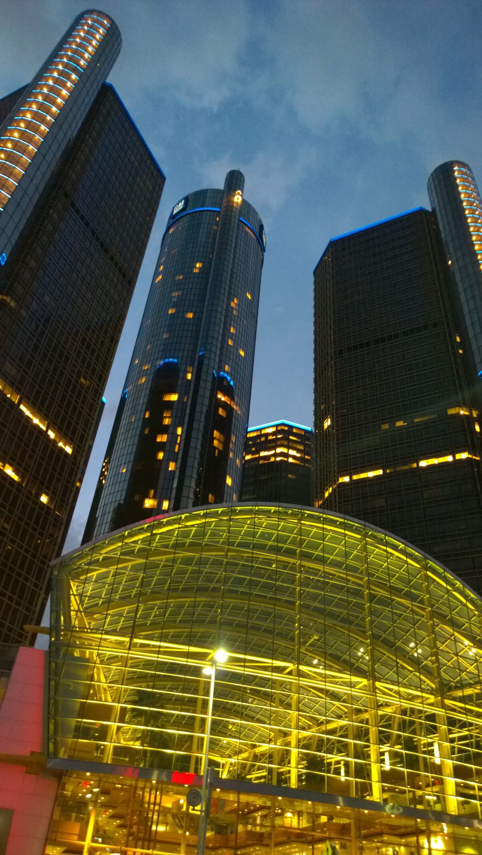 The Wintergarden glowing yellow and the towers at dusk, from the RiverWalk (2014)