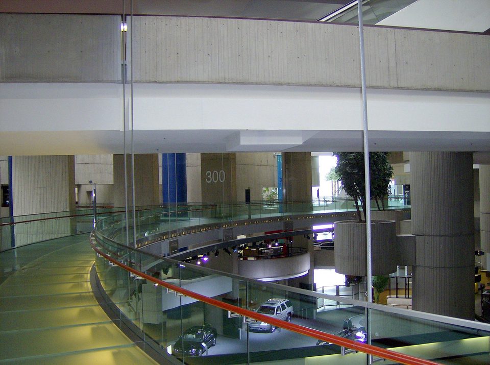 A glass-floored stretch of the circulation ring that links the towers, at the Tower 300 marker in 2007, with GM cars below
