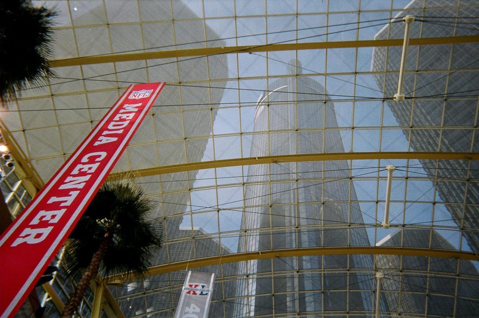 The red Super Bowl XL media center banner under the Wintergarden’s glass roof, 2006