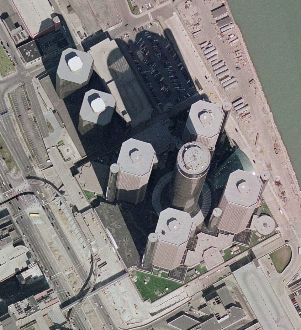 The whole complex from above in April 2002: the podium around the towers and the parking decks
