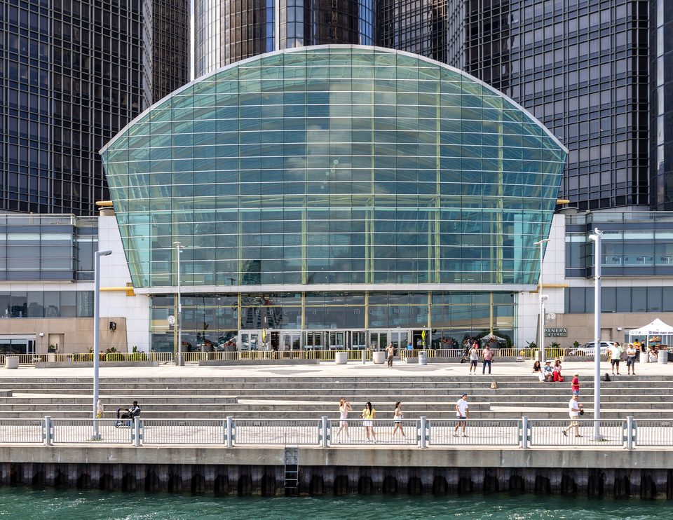 The Wintergarden seen from a boat on the Detroit River in July 2025, with the stepped riverfront promenade in front