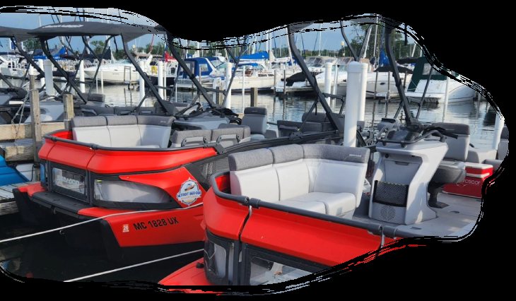 The company's fleet of red jet boats docked side by side at the marina